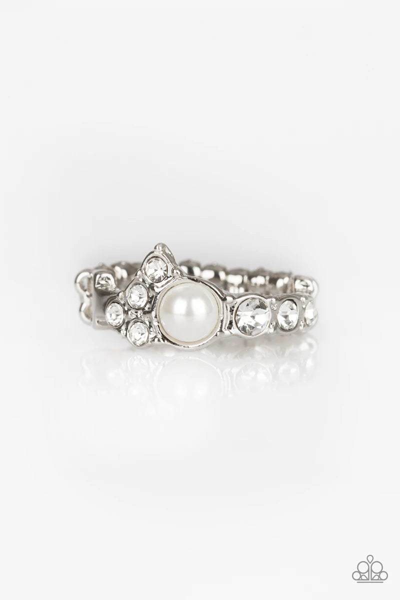 Paparazzi Accessories Center Stage Celebrity - White A dainty white pearl is pressed into an abstract white rhinestone encrusted band for a timeless twist. Features a dainty stretchy band for a flexible fit. Sold as one individual ring. Jewelry