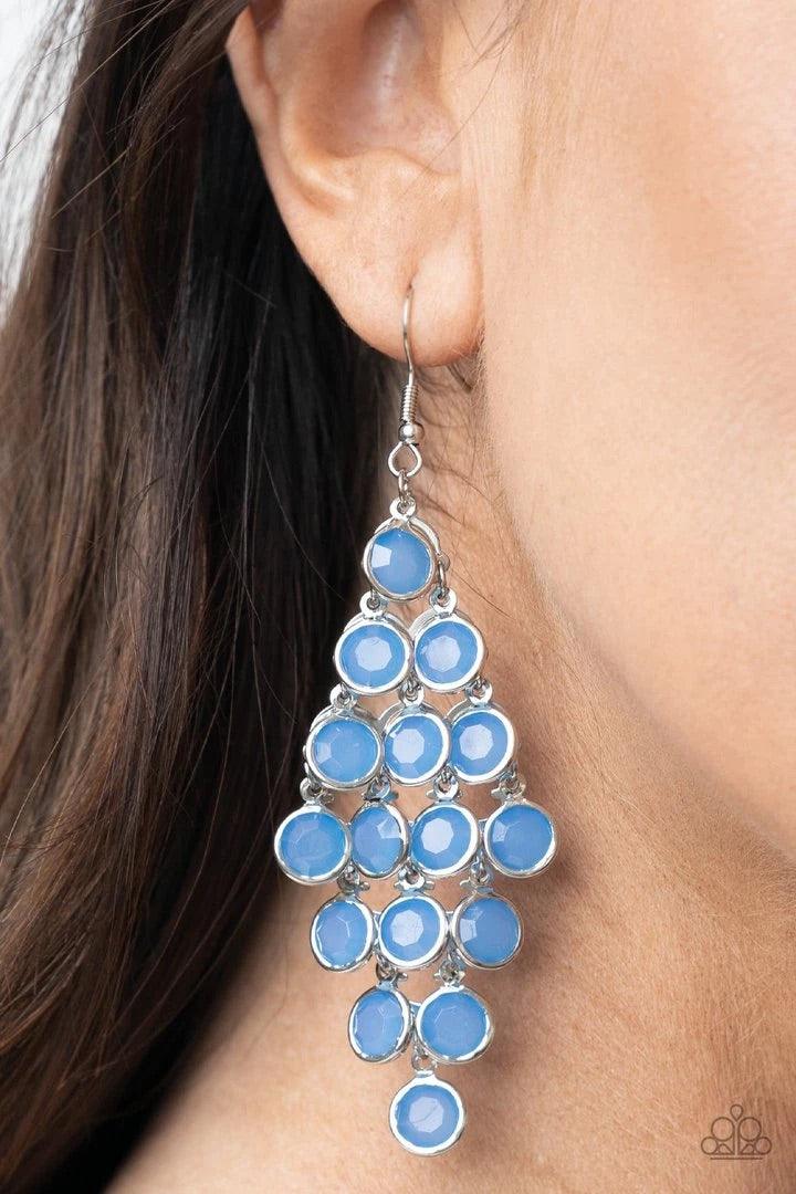 Paparazzi Accessories With All Dew Respect - Blue Encased in sleek silver fittings, a crystal-like collection of blue gems trickle from a silver netted backdrop, creating a dewy display. Earring attaches to a standard fishhook fitting. Sold as one pair of
