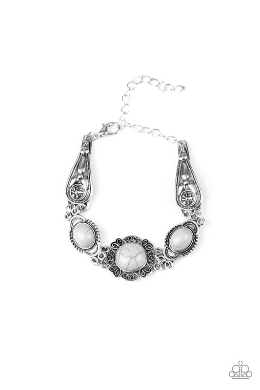 Paparazzi Accessories Serenely Southern - Silver Embossed in whimsical filigree, ornate silver frames link with a collection of neutral gray stone frames around the wrist for a seasonal flair. Features an adjustable clasp closure.Sold as one individual br