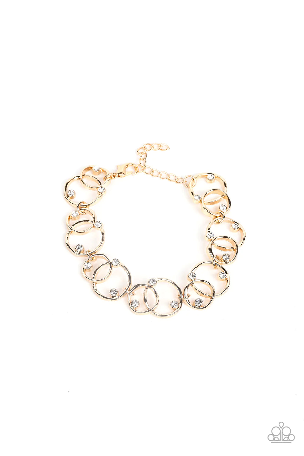 Paparazzi Accessories The Universe Revolves around Me - Gold Sporadically dotted in glassy white rhinestones, asymmetrical pairs of overlapping gold rings delicately link around the wrist for a dizzying display of industrial refinement. Features an adjust