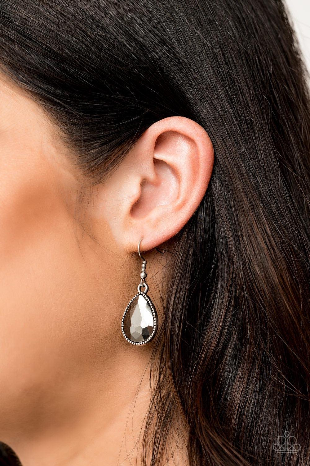 Paparazzi Accessories All Toget-HEIR Now - Silver Teardrop hematite rhinestones swing from the bottom of a bold silver chain, creating a dramatic fringe below the collar. A strand of glittery white rhinestones attach to the top of a shimmery silver chain,