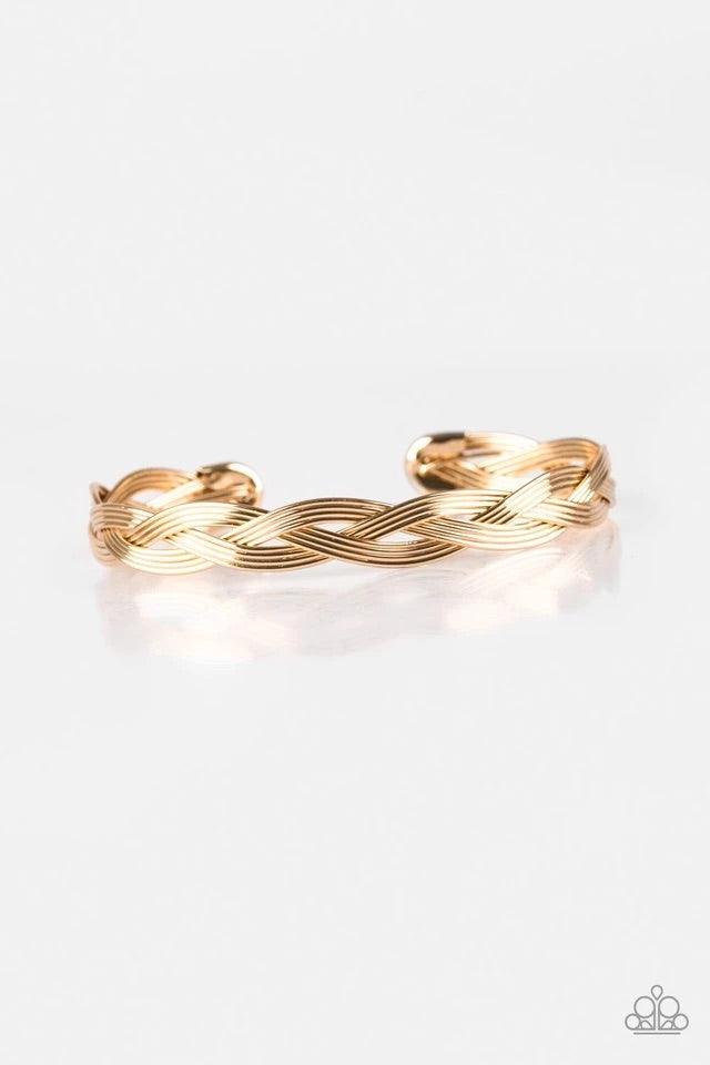Paparazzi Accessories Business As Usual - Gold Glistening gold wires braid across the wrist, coalescing into a dainty cuff. Sold as one individual bracelet. Jewelry