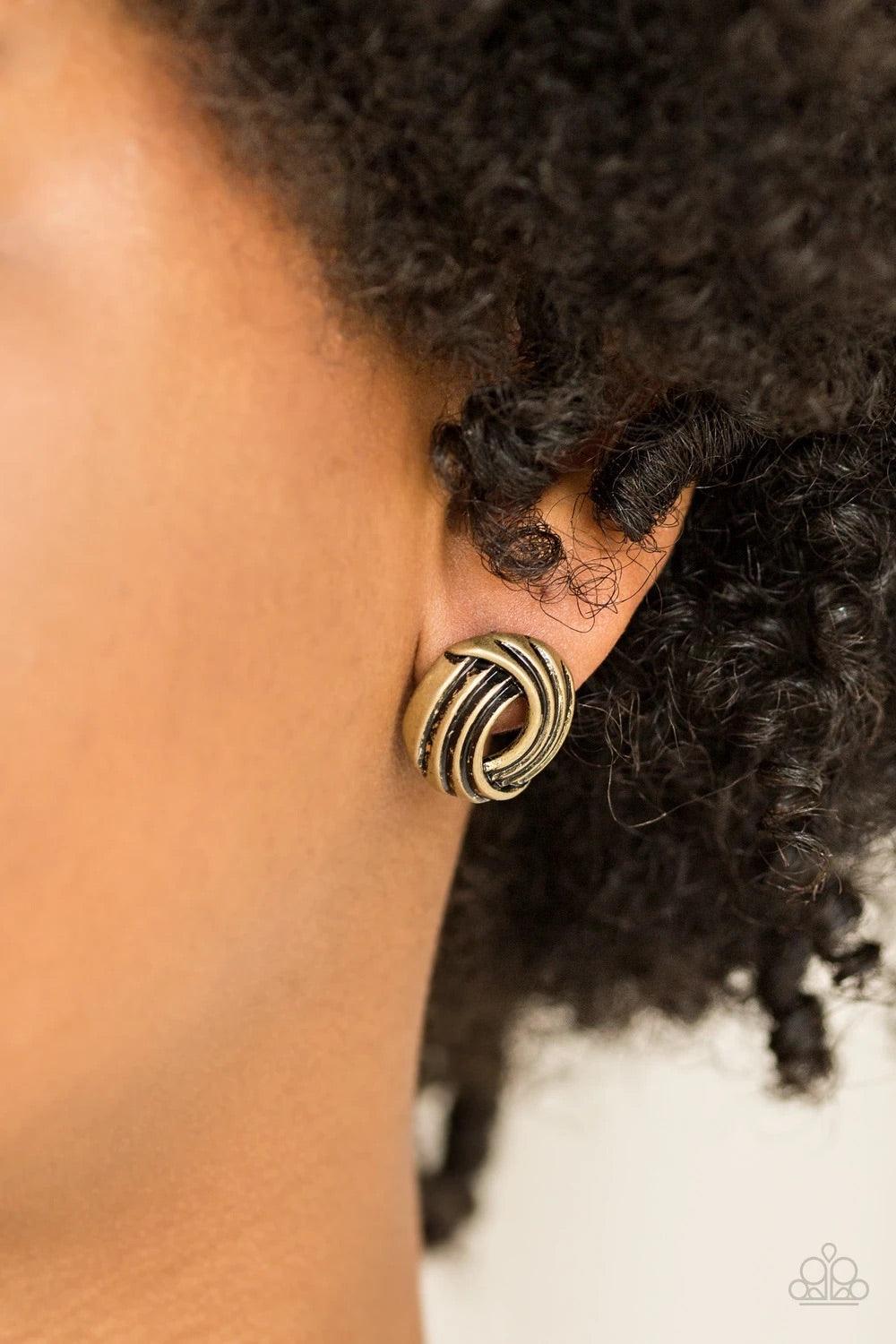 Paparazzi Accessories Rare Refinement ~Brass Rippling with shimmery textures, antiqued brass ribbons fold into a round frame for a radiant finish. Earring attaches to a standard post fitting. Sold as one pair of post earrings. Jewelry