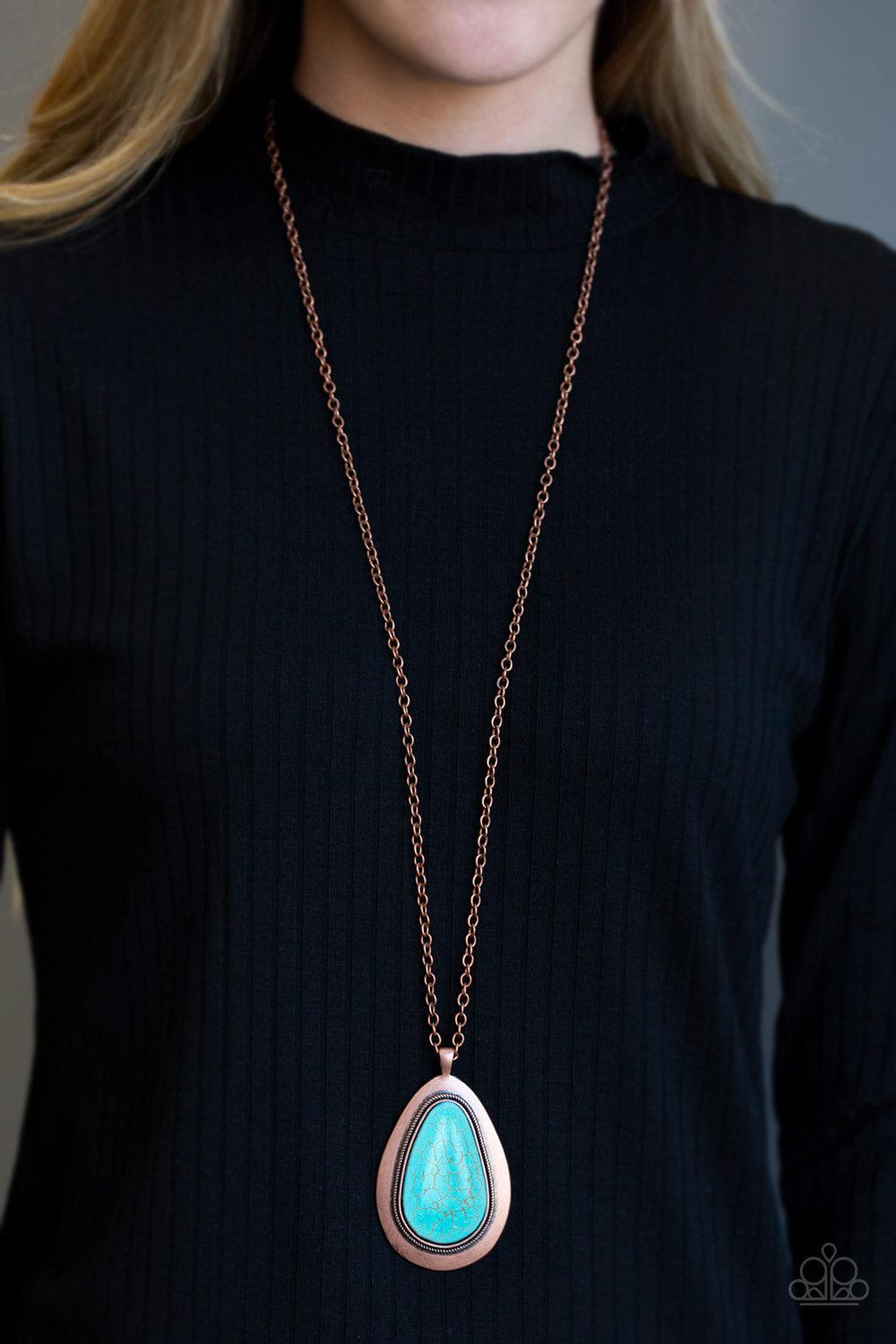 Paparazzi Accessories BADLAND To The Bone - Copper A dramatic turquoise stone teardrop is pressed into a glistening copper frame radiating with rustic patterns. The impressive pendant swings from the bottom of a lengthened copper chain for a seasonal look