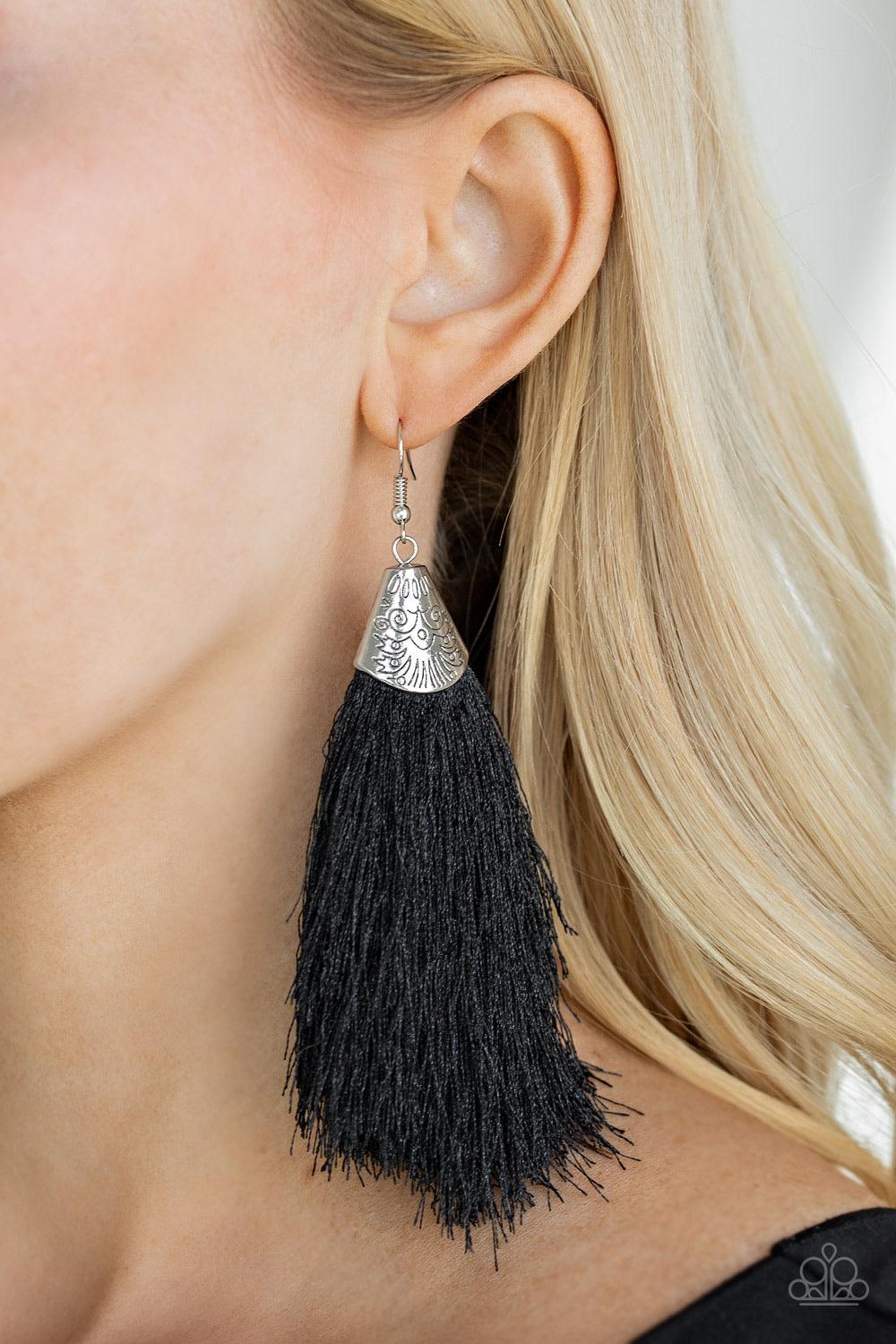 Paparazzi Accessories Tassel Temptress ~Black A plume of soft black thread is pinched between a shimmery silver fitting stamped in tribal inspired textures, creating a foxy tassel. Earring attaches to a standard fishhook fitting. Jewelry