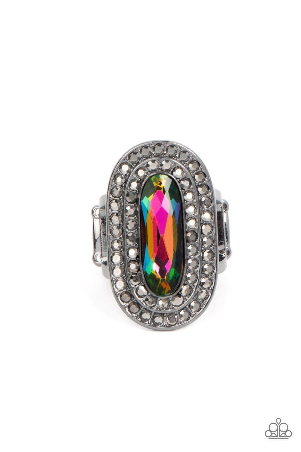 Paparazzi Accessories Fueled by Fashion - Multi An elongated sparkling oil spill gem is nestled inside a linear hematite frame created by double rows of dainty smoky rhinestones. The faceted gem creates a glamorously edgy effect atop the finger. Features