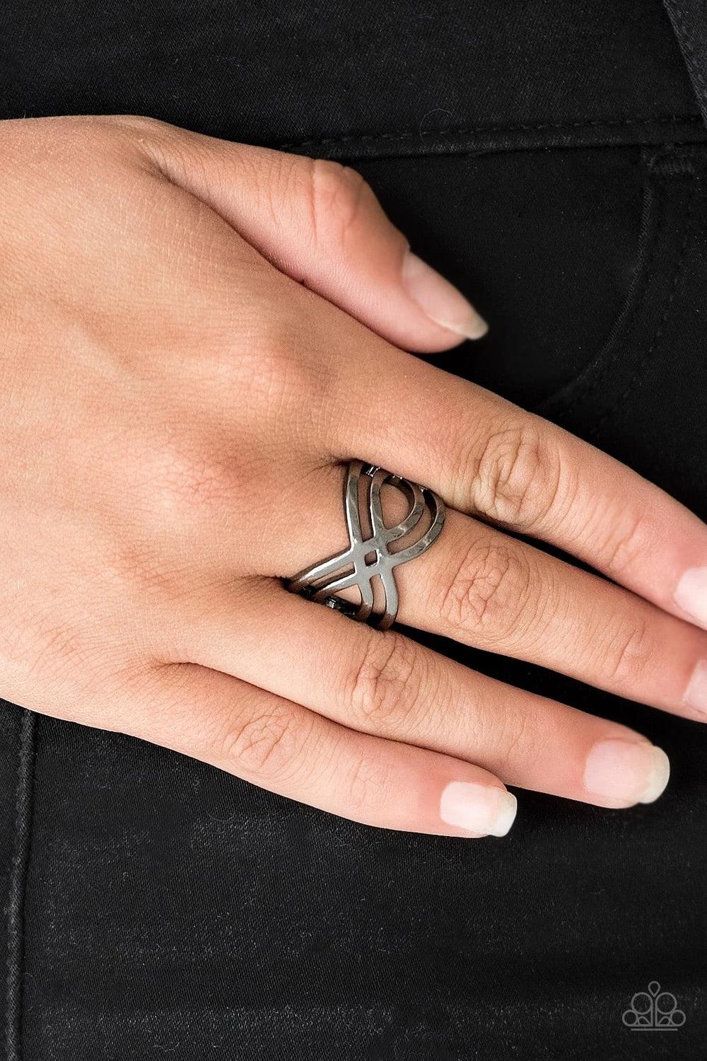 Paparazzi Accessories Infinite Fashion - Black Brushed in a high-sheen finish, glistening gunmetal bars ripple across the finger, coalescing into a whimsical infinity frame. Features a stretchy band for a flexible fit. Sold as one individual ring. Jewelry