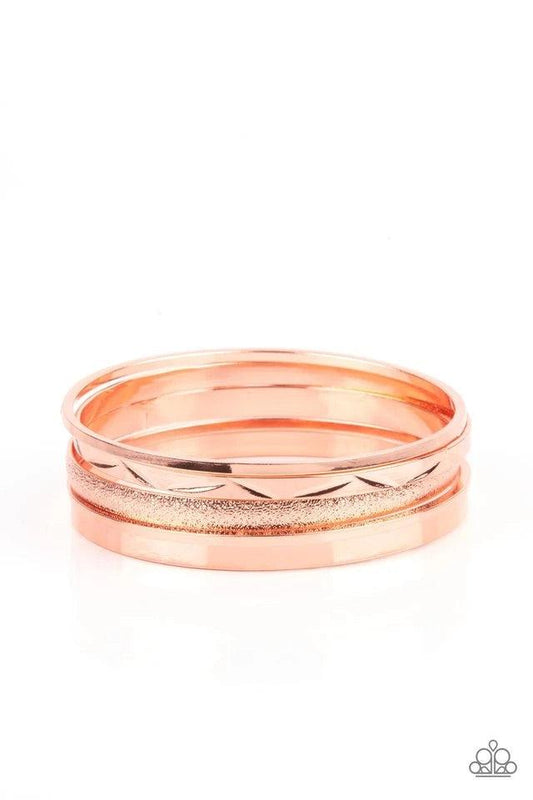 Paparazzi Accessories Stackable Style - Copper Varying in hammered, textured, and high sheen finishes, a mismatched collection of shiny copper bangles stacks across the wrist for a classic fashion. Jewelry