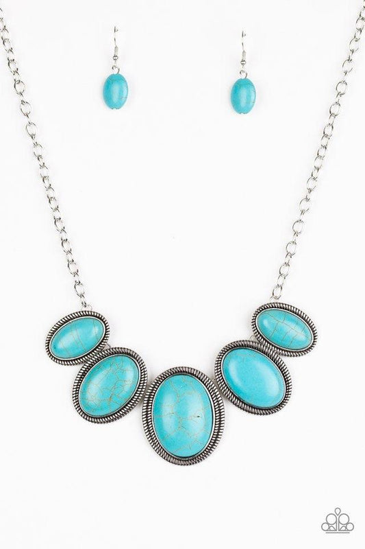 Paparazzi Accessories Noble Nomand - Blue Gradually increasing in size towards the center, refreshing turquoise stones are pressed into serrated silver frames, linking below the collar for a bold artisan look. Features an adjustable clasp closure. Jewelry