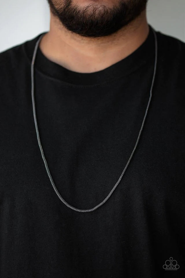 Paparazzi Accessories Underground - Black Brushed in a high-sheen finish, a shimmery strand of gunmetal mesh chain drapes across the chest for a sleek look. Features an adjustable clasp closure. Sold as one individual necklace. Necklaces