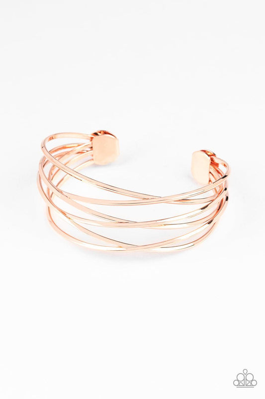 Paparazzi Accessories Down To The Wire - Copper Shiny copper wires crisscross across the wrist, coalescing into an edgy cuff. Jewelry