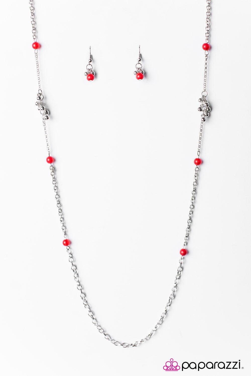 Paparazzi Accessories Twinkling Twilight - Red Red beads trickle down an elongated silver chain, creating a whimsical display. Clusters of dainty silver beads create fun and flirty accents as they trickle down the chain. Features an adjustable clasp closu