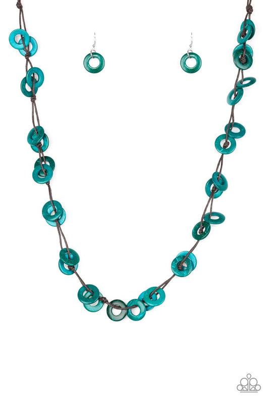 Paparazzi Accessories Waikiki Winds - Blue Shiny brown cording knots around refreshing blue wooden discs, creating a colorful display across the chest. Features a button loop closure. Sold as one individual necklace. Includes one pair of matching earrings