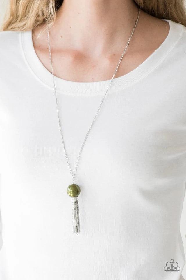 Paparazzi Accessories Belle of the BALLROOM - Green A dramatic pearly green bead swings from the bottom of an elegantly elongated silver chain. Featuring a hammered fitting, a silver tassel streams from the bottom of the colorful pendant for a whimsical f