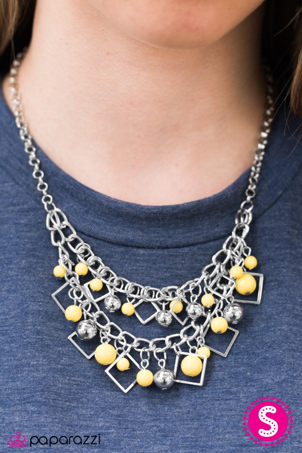 Paparazzi Accessories Finally FRAME-ous - Yellow Sunny yellow and classic silver beading cascade from two rows of bold silver chain. Glistening silver frames trickle between the colorful fringe, adding a trendy geometric flair to the flawlessly layered pa