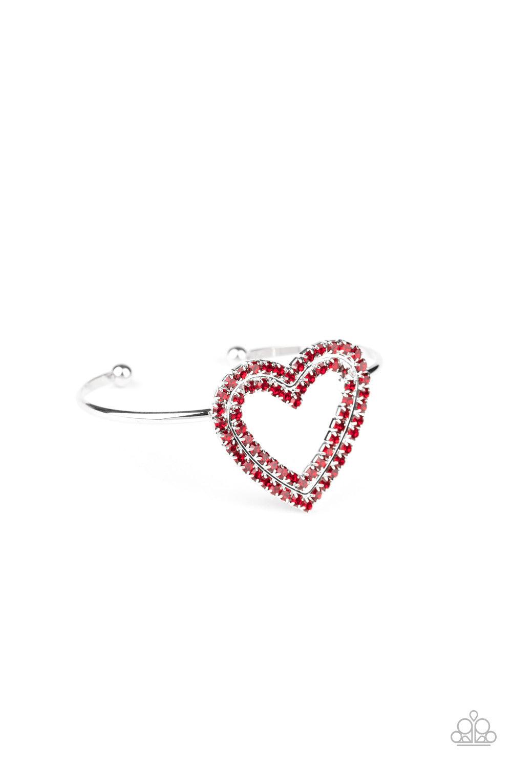 Paparazzi Accessories Heart Opener - Red Two rows of glittery red rhinestones stack into a sparkling heart atop a dainty silver cuff for a charming look. Jewelry
