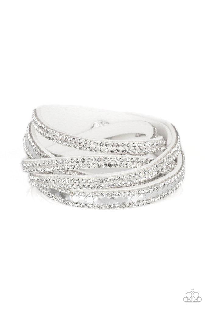 Paparazzi Accessories Rock Star Attitude - White Encrusted in rows of glassy white rhinestones and flat silver studs, three strands of gray suede wrap around the wrist for a sassy look. The elongated band allows for a trendy double wrap around the wrist.