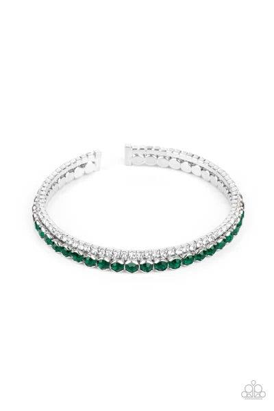 Paparazzi Accessories Fairytale Sparkle - Green Mismatched strands of glassy white and glittery green rhinestones stack into a dainty cuff around the wrist, creating a sparkly centerpiece. Sold as one individual bracelet. Bracelets