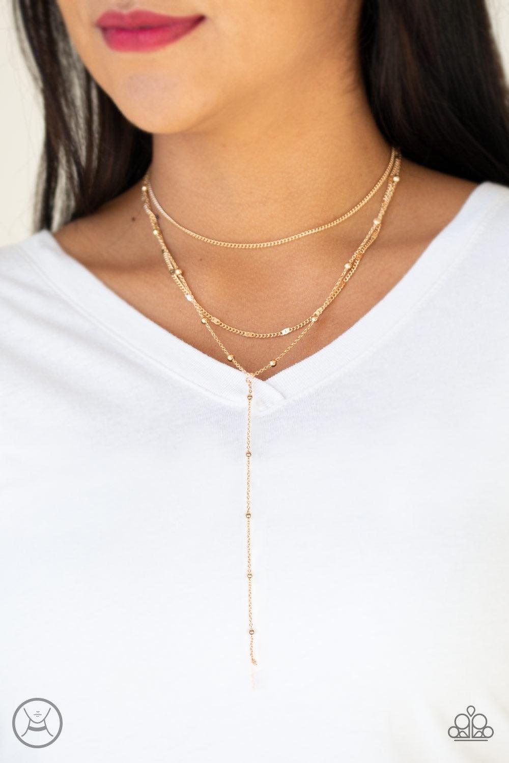 Paparazzi Accessories Think Like A Minimalist - Gold A row of beaded gold chain, a plain gold chain, and a chain featuring flattened links layer around the neck for a minimalist inspired look. Features an adjustable clasp closure. Jewelry