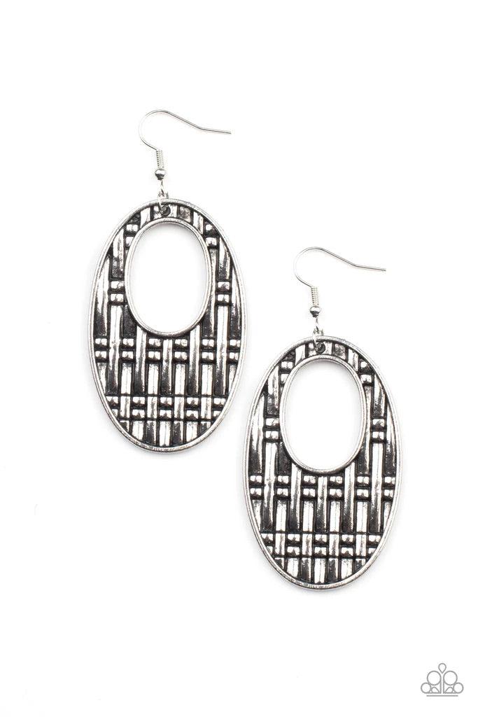 Paparazzi Accessories Engraved Edge - Silver Oversized antiqued silver oval cut-out frames are embossed with a bold basket weave design resulting in a dramatic statement making finish. Earring attaches to a standard fishhook fitting. Sold as one pair of e
