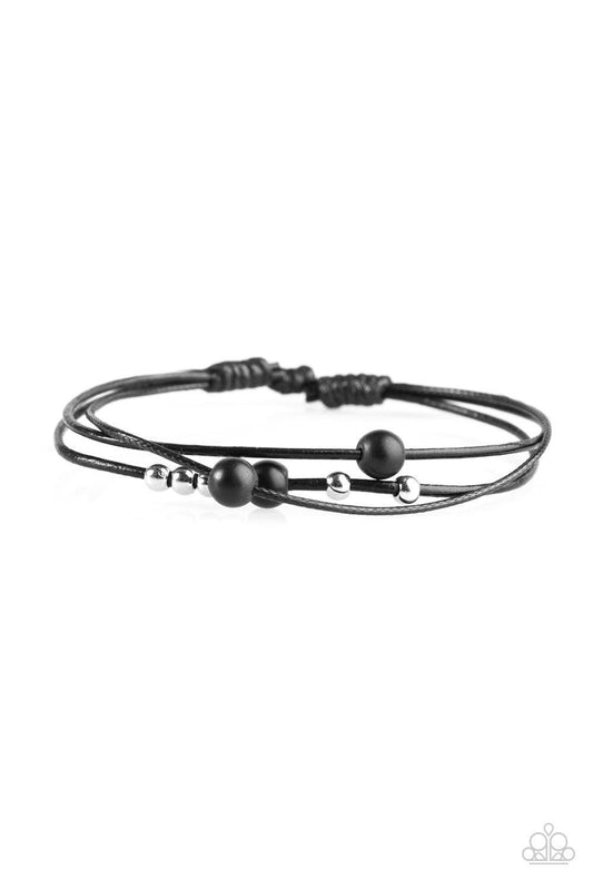 Paparazzi Accessories Mountain Treasure - Black Shiny silver beads and refreshing white stones are threaded along shiny black cording, creating dainty layers across the wrist. Features an adjustable sliding knot closure. Sold as one individual bracelet. J