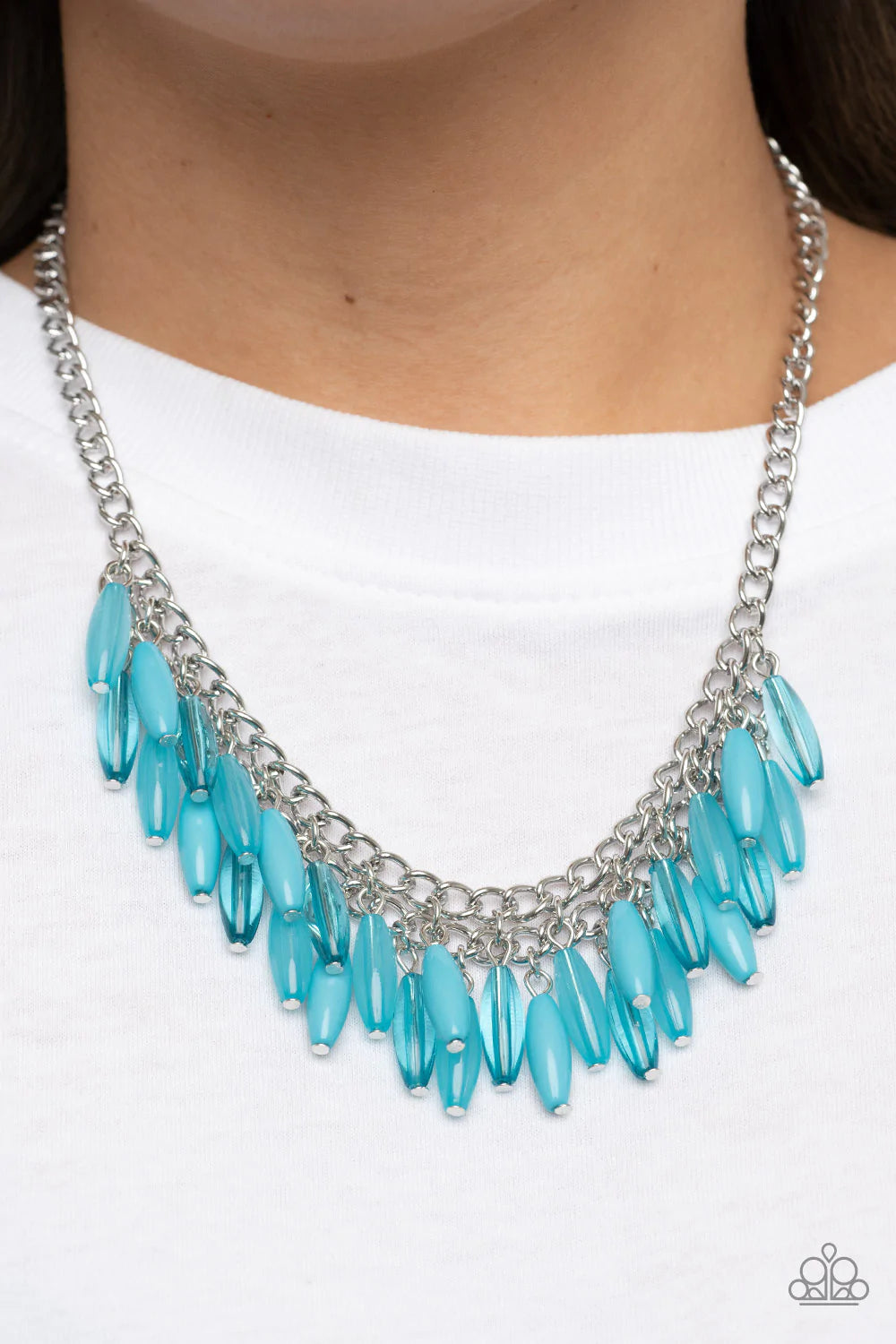 Paparazzi Accessories Beach House Hustle - Blue Varying in opaque, acrylic, and glassy finishes, a refreshing collection of oblong blue beads cascade from interlocked silver chains below the collar, resulting in a whimsical fringe. Features an adjustable