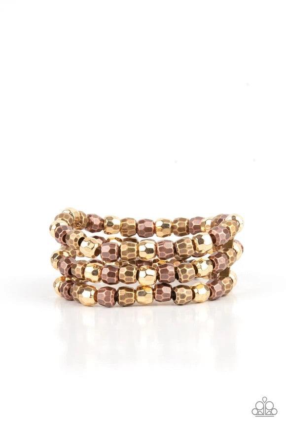 Paparazzi Accessories Magnetically Maven ~Multi Held together with dainty brass fittings, rows of faceted brass, copper, and gold beads are threaded along stretchy bands around the wrist, coalescing into bold layers. Sold as one individual bracelet. Jewel