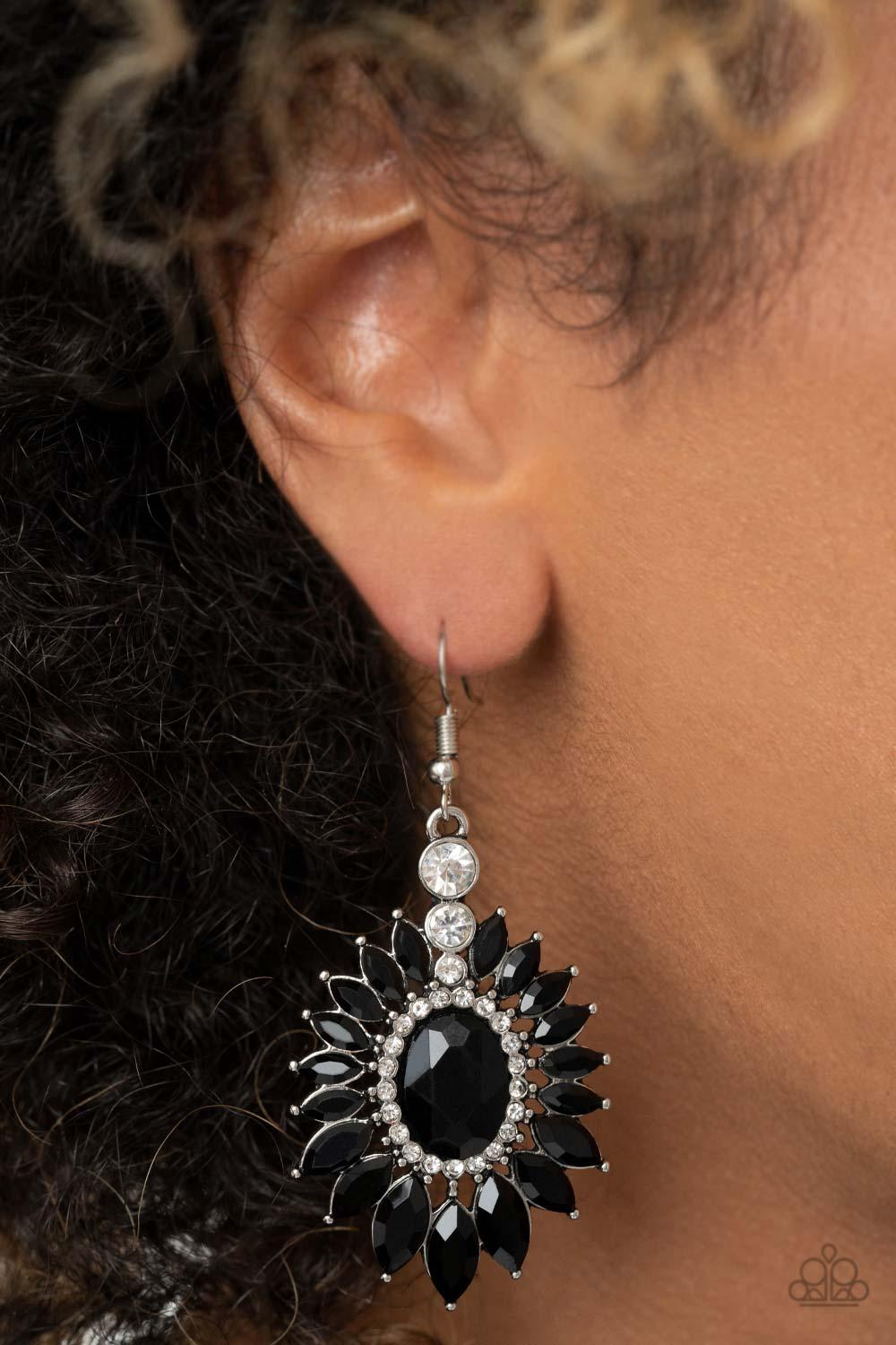 Paparazzi Accessories Big Time Twinkle - Black Glittery black marquise cut rhinestones fan out from a black oval gem center bordered in dainty white rhinestones, creating a sparkly floral frame. Earring attaches to a standard fishhook fitting. Jewelry