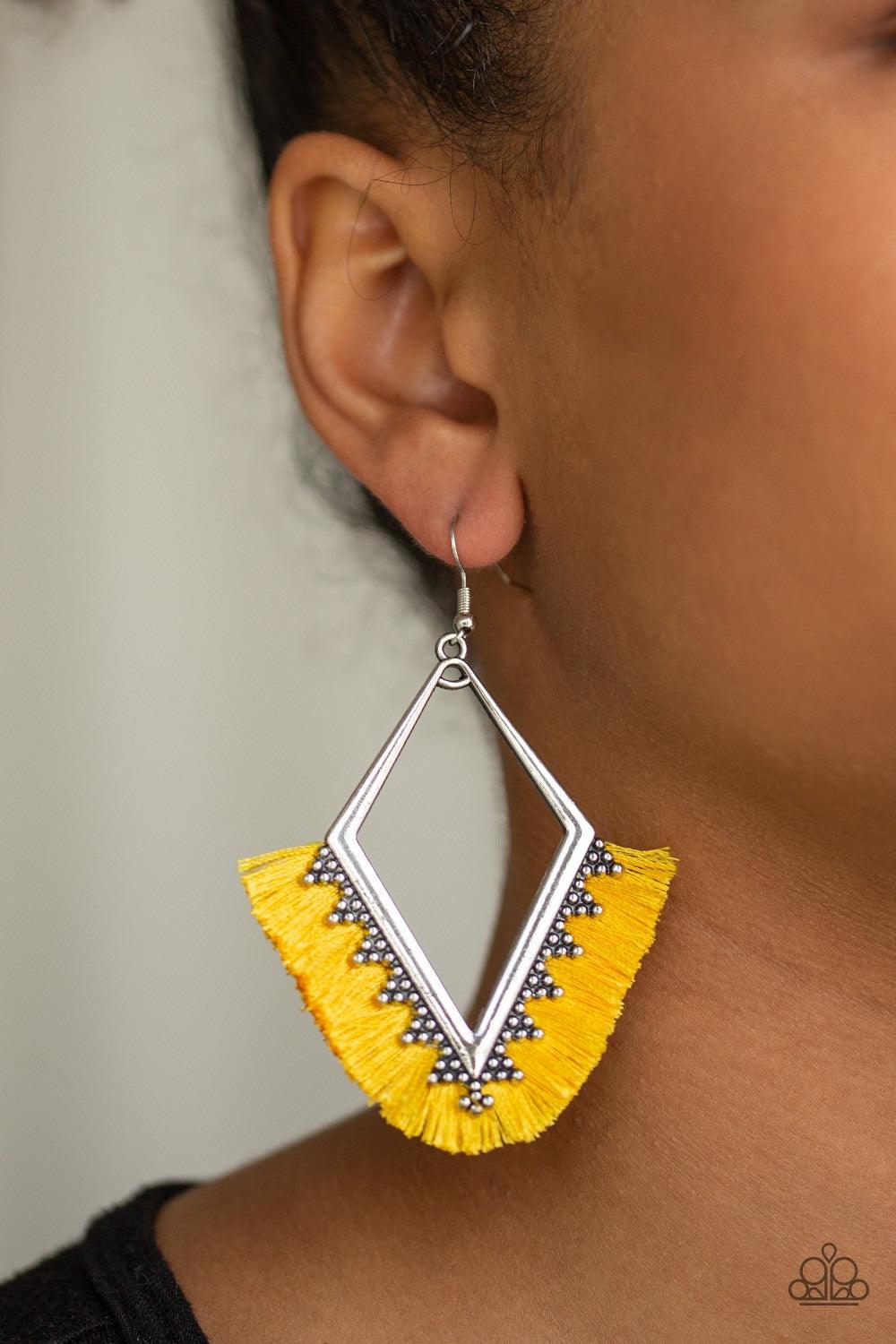 Paparazzi Accessories When in Peru - Yellow A fan of shiny yellow thread flares out from the bottom of a kite-shaped silver frame radiating with studded details for a flirtatious look. Earring attaches to a standard fishhook fitting. Jewelry