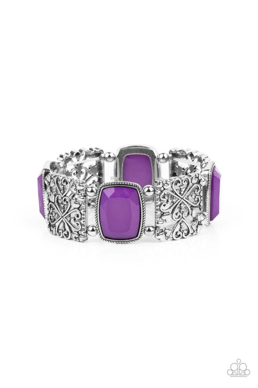 Paparazzi Accessories Colorful Coronation - Purple Infused with dainty silver heart accents, whimsically filled silver filigree frames and faceted Amethyst Orchid beads are threaded along stretchy bands around the wrist for a colorful flair. Sold as one i