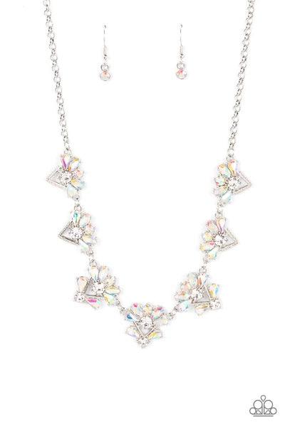 Paparazzi Accessories Extragalactic Extravagance - Multi Featuring a stellar radiance, clusters of teardrop and marquise cut iridescent rhinestones fan out from white rhinestone centers along the tops of studded and pronged triangular frames. The centermo
