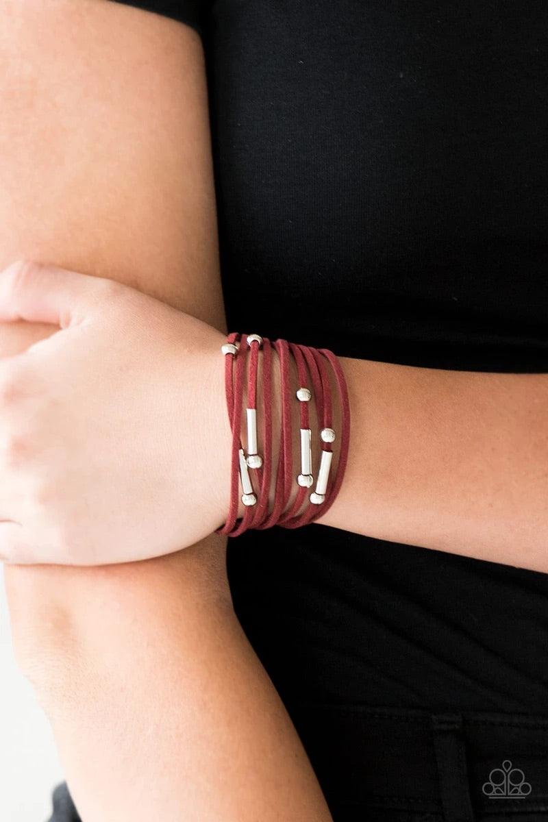 Paparazzi Accessories Back To BACKPACKER - Red Strung between two silver fittings, glistening silver and gunmetal accents slide along strands of red suede for a seasonal look. Features an adjustable clasp closure. Sold as one individual bracelet. Jewelry