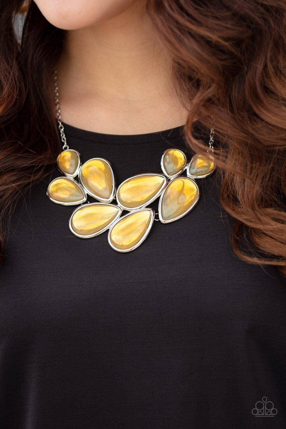 Paparazzi Accessories Iridescently Irresistible - Yellow Sleek silver frames encase opalescent yellow teardrops that cluster together to create a bubbly statement piece. Features an adjustable clasp closure.Sold as one individual necklace. Includes one pa