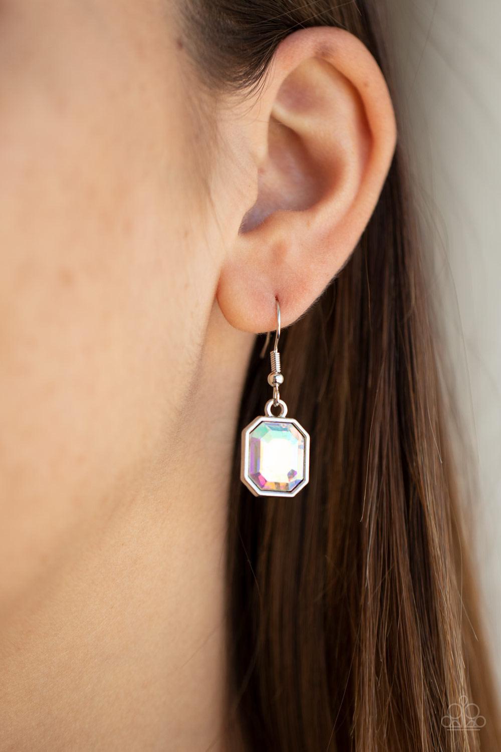 Paparazzi Accessories Million Dollar Moment - Multi Featuring an out-of-this-world iridescence, emerald-cut iridescent gems delicately link below the collar. Attached to a dainty silver chain, the glittering row of rhinestones gives way to a dramatically