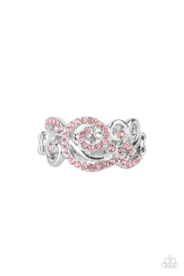 Paparazzi Accessories Melodic Motion - Pink An ornamental silver scrollwork frame, adorned with dainty sparkling pink rhinestones travels across the finger in a melodic display. Features a dainty stretchy band for a flexible fit. Jewelry