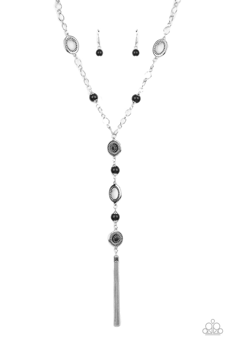 Paparazzi Accessories The Natural Order - Black Dotted with dainty black stone centers, silver floral frames join mismatched silver accents and earthy black stones along an extended tassel that connects to sections of chunky silver chain. A shimmery silve
