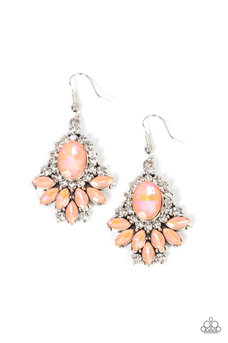 Paparazzi Accessories Magic Spell Sparkle - Orange Featuring a stellar opalescent finish, staggered layers of marquise cut coral rhinestones fan out from an oversized coral gem that is bordered in a ring of glittery white rhinestones for an enchanting fin