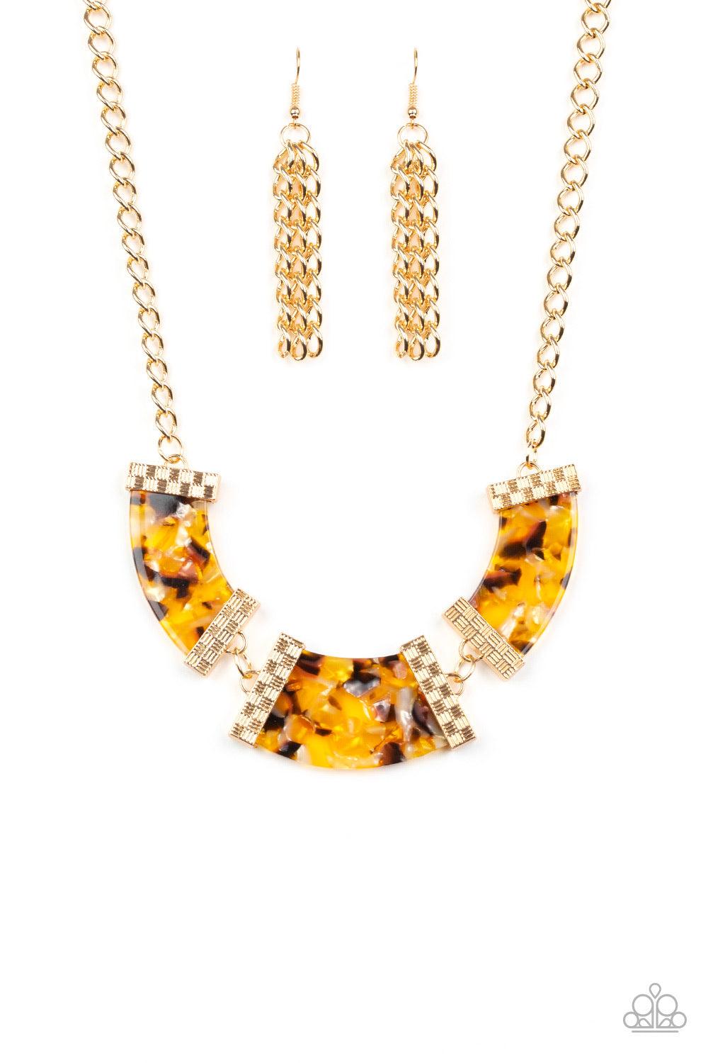 Paparazzi Accessories HAUTE Blooded - Yellow A trio of speckled acrylic frames are nestled inside checker textured gold fittings as they link below the collar for a seasonal flair. Features an adjustable clasp closure. Jewelry