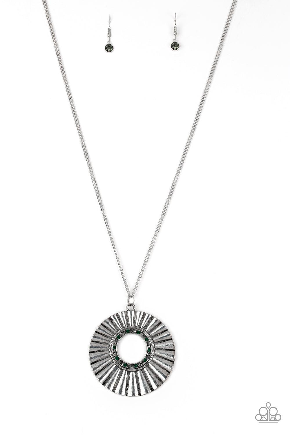 Paparazzi Accessories Chicly Centered - Multi Brushed in a gritty antiqued finish, a rippling silver frame flares from a multicolored rhinestone encrusted center for an edgy look. Features an adjustable clasp closure. Sold as one individual necklace. Incl