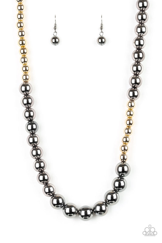 Paparazzi Accessories Power To The People - Black Varying in size, glistening gold and shimmery gunmetal beads drape below the collar in a dramatically asymmetrical fashion. Features an adjustable clasp closure. Sold as one individual necklace. Includes o