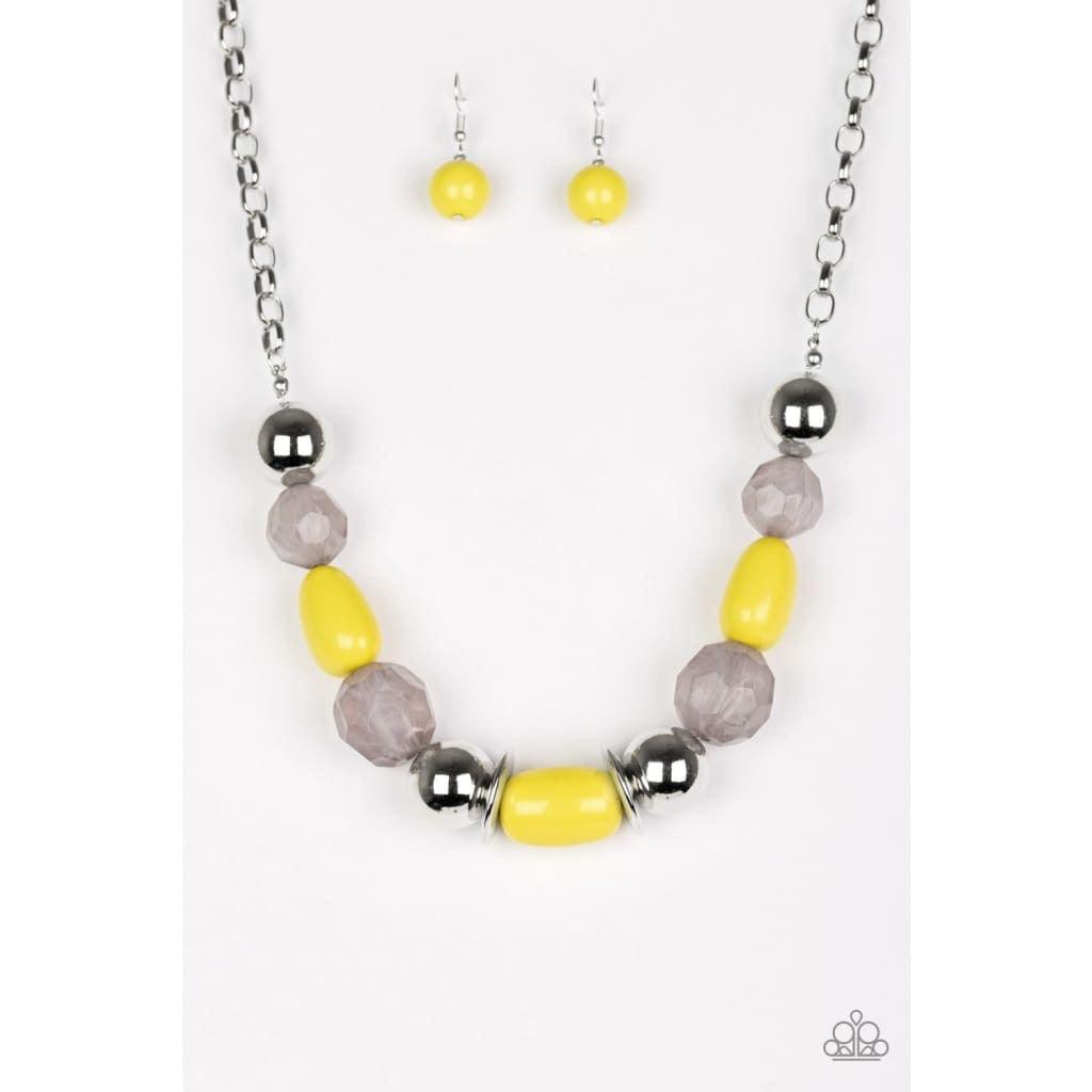 Paparazzi Accessories South Shore Sensation - Yellow Dramatic silver, sunny yellow, and faceted cloudy beads are threaded along an invisible wire below the collar for a seasonal look. Features an adjustable clasp closure. Jewelry