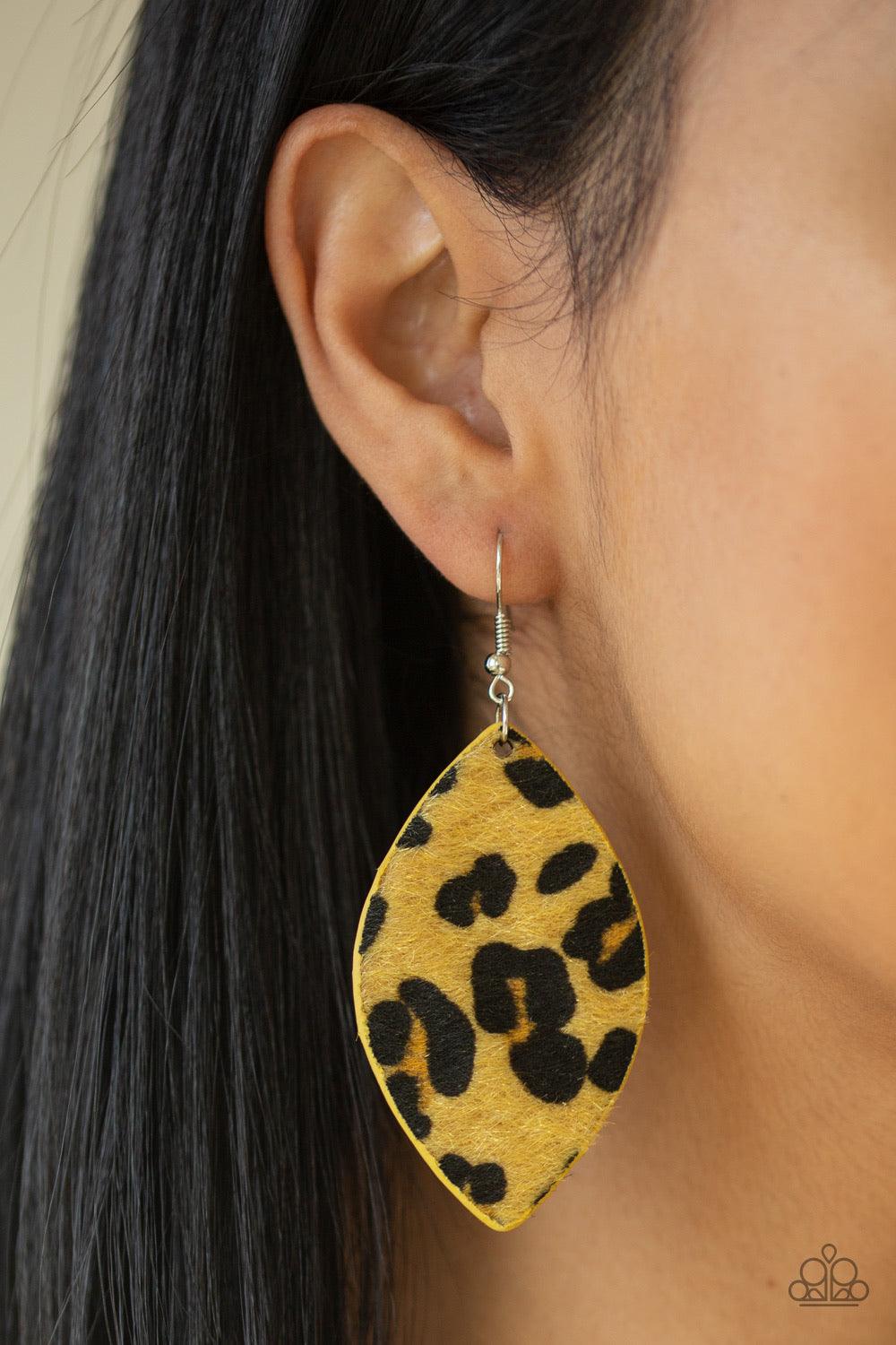 Paparazzi Accessories GRR-irl Power! - Yellow Featuring black cheetah print, a fuzzy yellow almond-shaped frame swings from the ear for a wild look. Earring attaches to a standard fishhook fitting. Jewelry