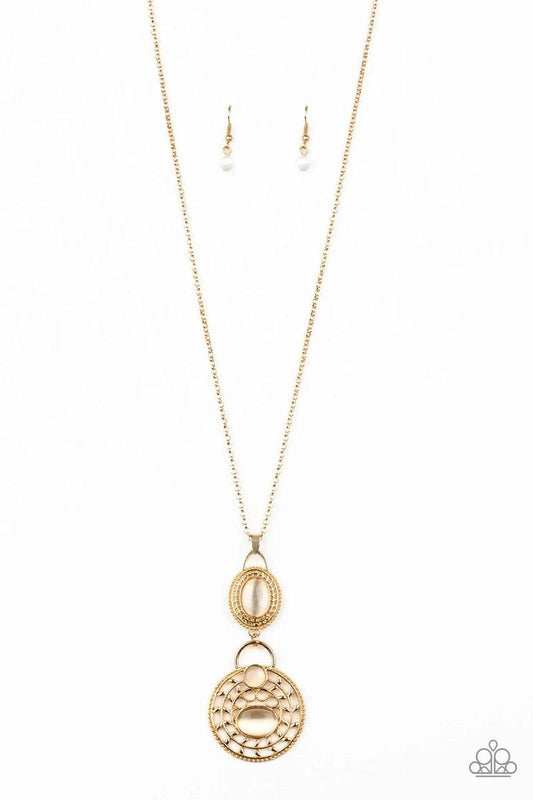 Paparazzi Accessories Hook, Vine, and Sinker - Gold Dotted with glowing cat's eye accents, two dizzying gold frames swing at the bottom of a lengthened gold chain. The stacked pendants swirl with studded patterns and vine-like filigree for a seasonal flai