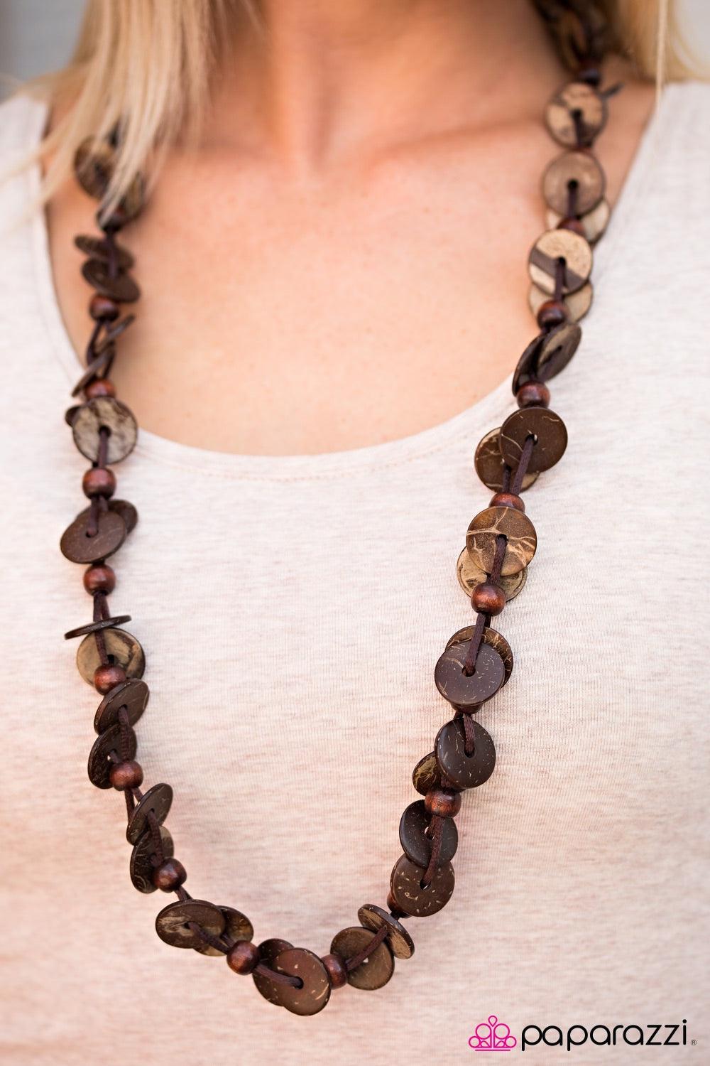 Paparazzi Accessories Caribbean Carnival - Brown Shiny wooden discs brushed in a brown finish trickle along shiny brown cording, creating two knotted layers. Brown wooden beads alternate along the earthy discs, adding an earthy flair to the summery palett