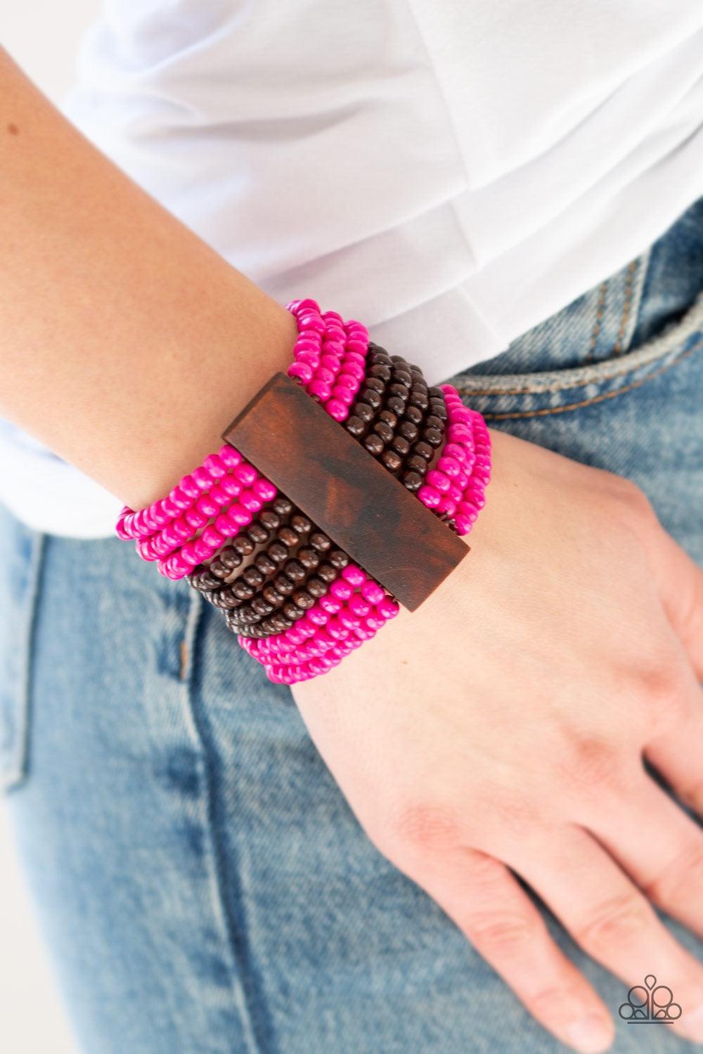 Paparazzi Accessories JAMAICAN Me Jam - Pink Infused with rectangular wooden beads, a collection of pink and brown wooden beads are threaded along stretchy bands for a summery flair. Jewelry
