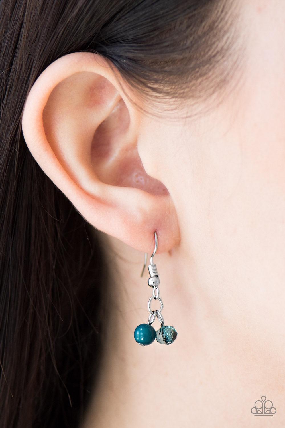 Paparazzi Accessories Sparkling Sophistication - Blue Polished Shaded Spruce and crystal-like beading trickle along a dainty silver chain for a sophisticated look. Marquise-shaped silver discs are sprinkled between the colorful beading for a shiny finish.