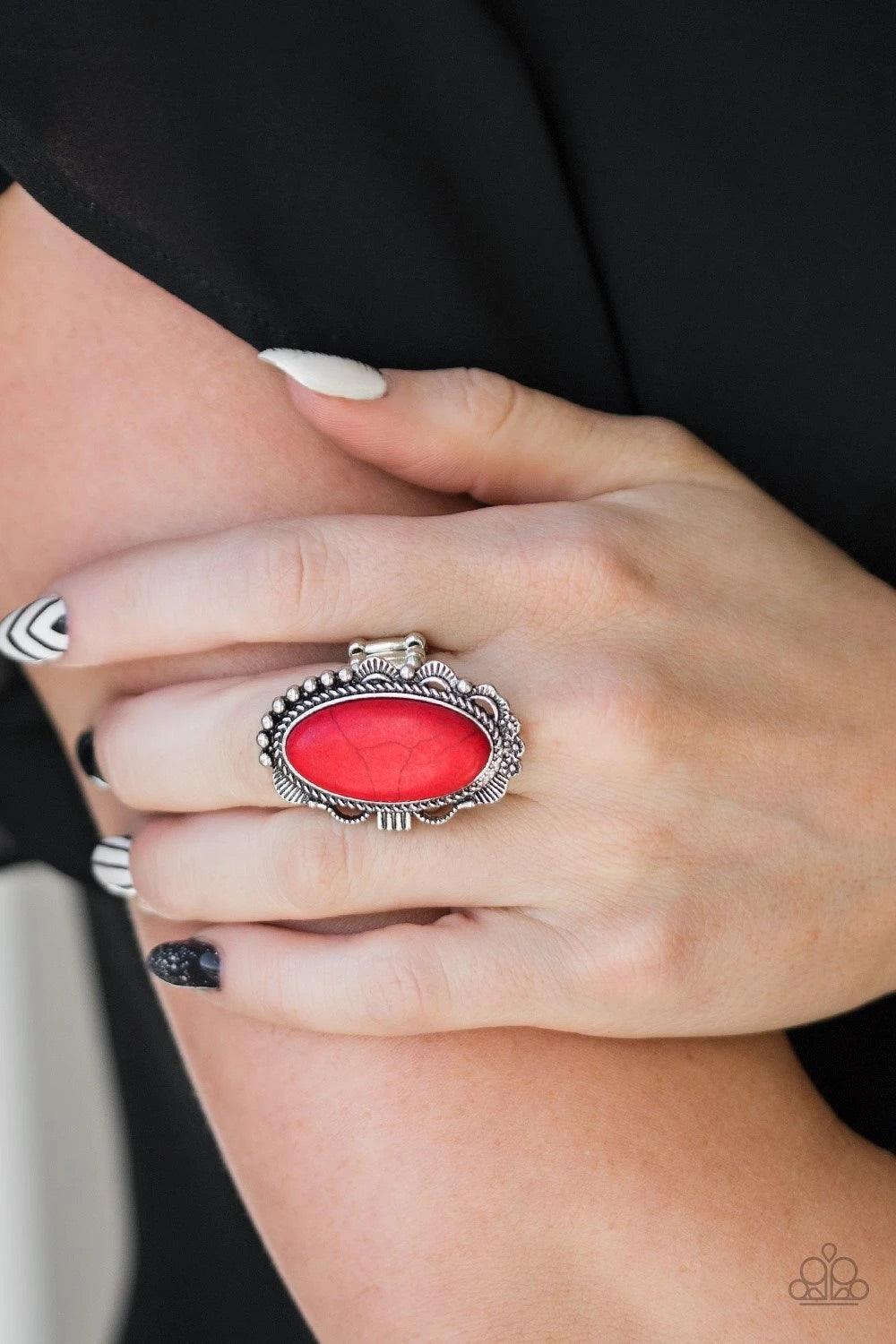 Paparazzi Accessories Open Range - Red A fiery red stone is pressed into an ornate silver frame rippling with studded and serrated textures for a seasonal flair. Features a stretchy band for a flexible fit. Sold as one individual ring. Jewelry