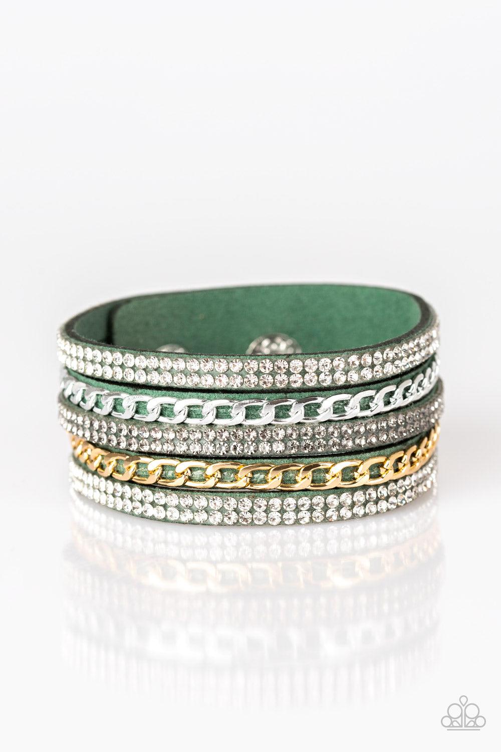 Paparazzi Accessories Fashion Fiend - Green Glassy white and smoky rhinestones are encrusted along strands of green suede. Glistening silver and gold chains are added to the bands, adding edgy industrial shimmer to the sassy palette. Features an adjustabl