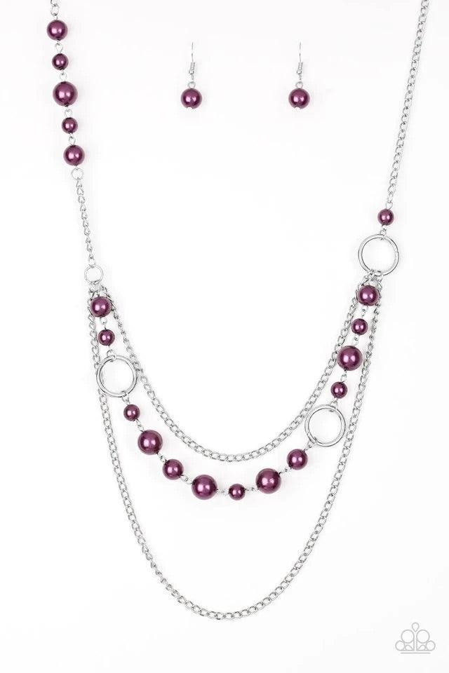 Paparazzi Accessories Party Dress Princess - Purple Pearly purple beads and shimmery silver hoops trickle along glistening silver chains, creating mismatched layers down the chest. Features an adjustable clasp closure. Jewelry