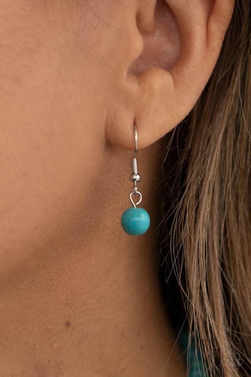 Paparazzi Accessories A Heart of Stone - Blue Bordered by dainty turquoise stones, an oversized turquoise stone heart pendant swings from the bottom of a turquoise stone and silver beaded display below the collar for a flirtatiously earthy fashion. Featur